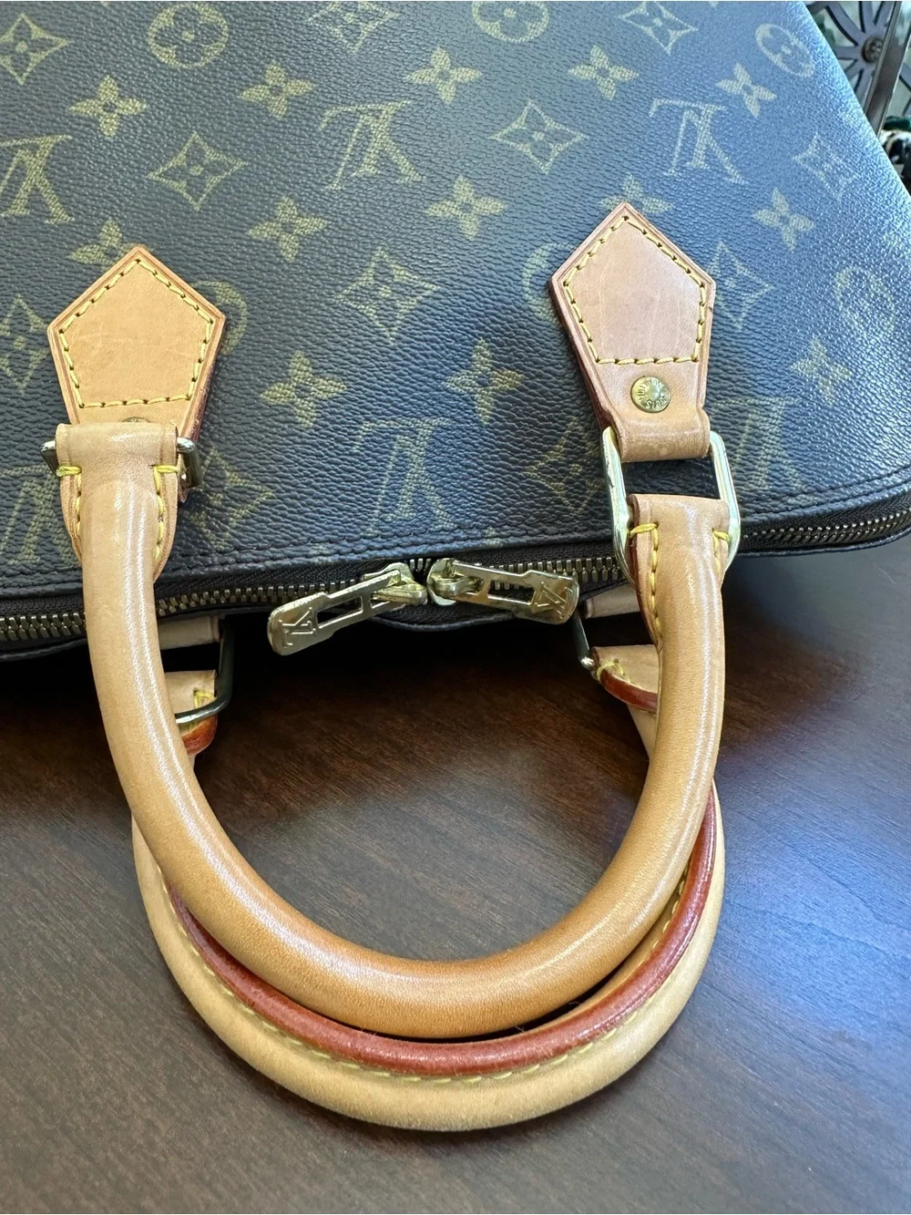 Louis Vuitton Monogram Alma PM Handbag in Brown and Tan